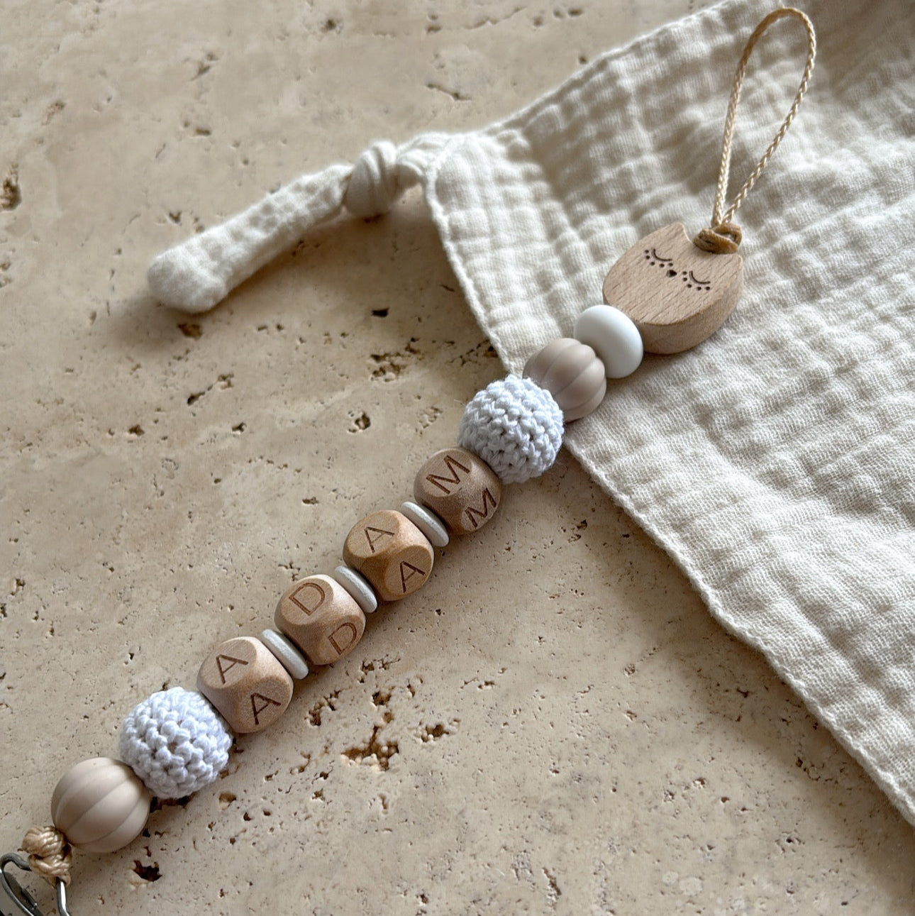 Attache-tétine ADAM